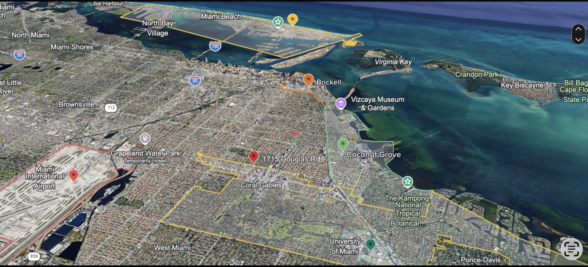 Aerial of Miami with 1715 Douglas Road marked between Coral Gables, Coconut Grove and Brickell